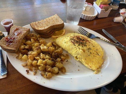 Jock cresteau omlete and it was wonderful made with big chunks of crab and mushrooms strawberry jam with fresh chunks of strawberries