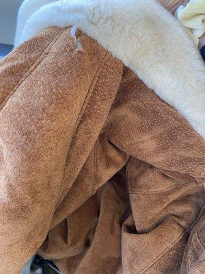 My full length fur lined suede coat was returned to me, UNCLEANED AND DAMAGED They received it without damaged now it's damaged!!