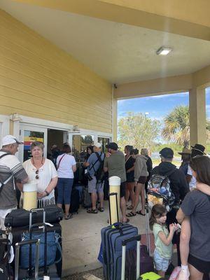 This is the line going out the door. At least 2 dozen people in line. We've been waiting over 3 hours.
