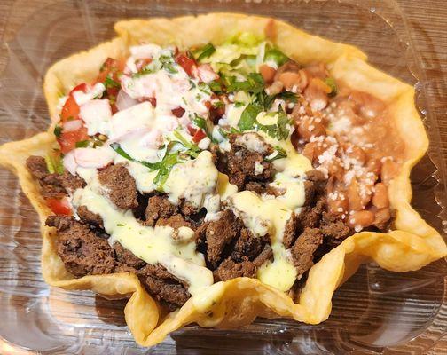 Steak Rice taco, $12.99. Lower price then other locations but portion is slightly smaller. Shell was a tad underdone. It should be crispier.