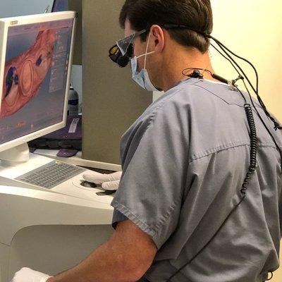 Dr. Portacci making a CEREC same-day Crown in our office