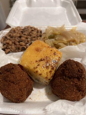 Salmon croquettes, hop n John (black eye peas over rice, cabbage and cornbread.