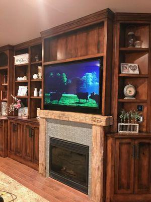 Reclaimed wood, knotty alder and faux finished