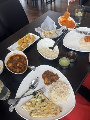 Vindaloo, Butter Chicken, Garlic Naan, & Paneer Pakora