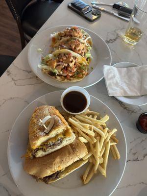 Shrimp tacos and Sliced Prime Rib Sandwich