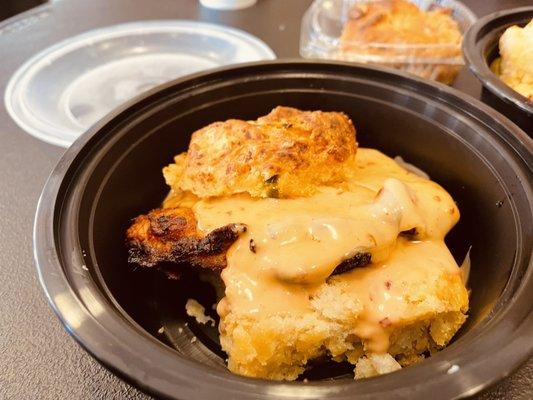 B.Y.O.B. Jalapeño cheddar biscuit with fried chicken, pepper jack cheese, and bang bang sausage.