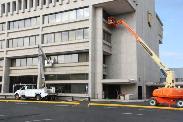 Our commercial window washing team helping First Merchants Bank keep their building looking beautiful.