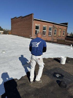 Sealing up the paint shop roof