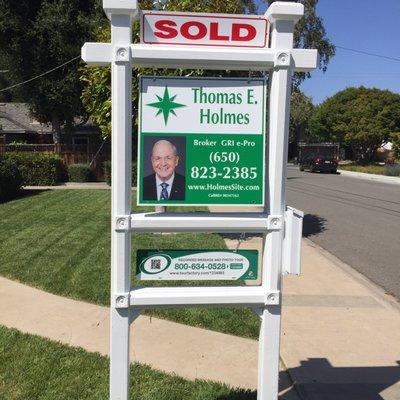 Thomas E. Holmes, GRI