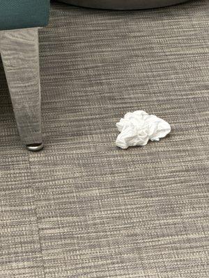 Dirty tissue on floor