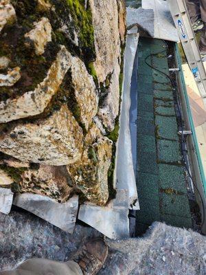 We cleaned the moss up, I tucpointed it, and we did a new crown.