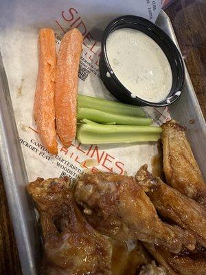 Carrots served with the wings. Delivered to me by the manager. Really??? You would serve a customer dried up cracked carrot sticks.