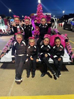 Annual Sachse Christmas parade! Our youth pep cheer squad riding on the back of the float! Barbie themed of course!