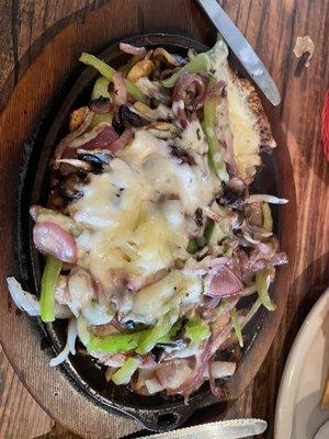 Pollo Parrilla- chicken, peppers Swiss cheese and mushrooms