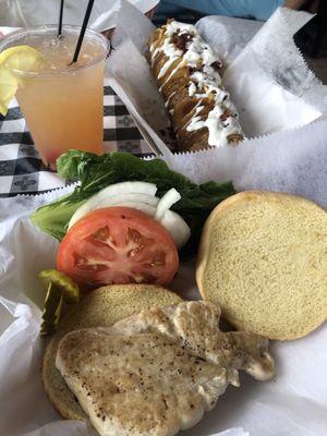 Grilled chicken sandwich and loaded potato