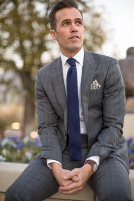 Subtle details like the slim peak lapels and contrasting pocket square can elevate your custom suit game.