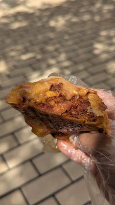 Inside a chorizo and egg burrito