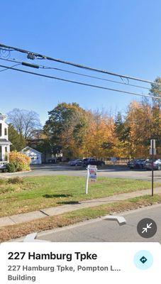 Busy road with plenty of cars coming and going seeing your name on the main sign..