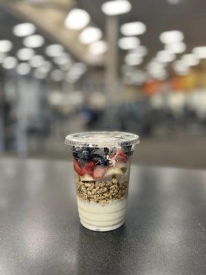 Blessed Bowl - A wholesome blend of granola, fresh strawberries, bananas, blueberries, non-fat yogurt, and protein, topped with flavorful ga