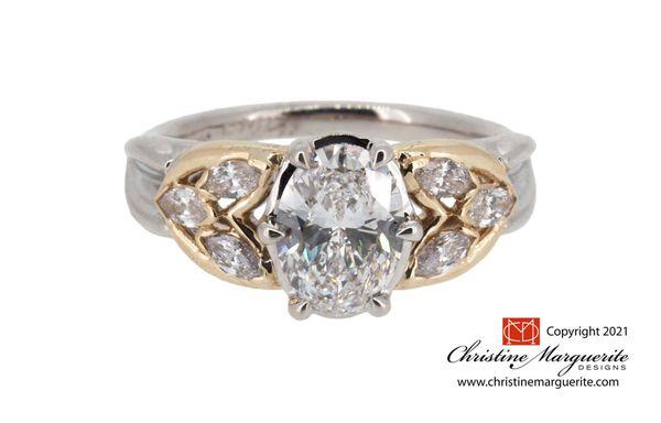 Custom CMD 14KY and 14KW gold setting with 1.0 ct lab grown oval center diamond and lab grown diamond accents.