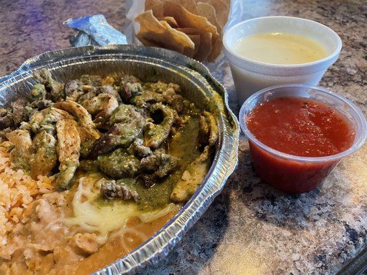 DoorDash Chile Verde. Their version is beef and chicken. Precut fajita meat. Green nor red salsa had any merit. Cheese dip sux