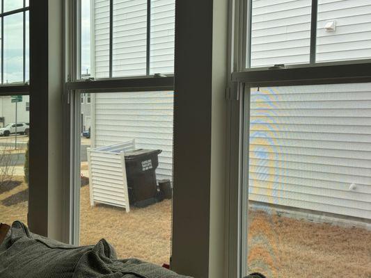 TRASH BINS in view of home main windows. UNACCEPTABLE!!!!
