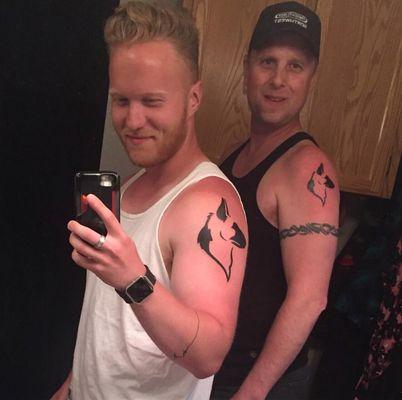 Father and Son "Shepard" tattoo, watching their backs for life. Work done by Solomon.