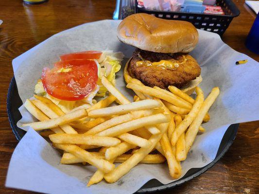 Crispy fried chicken sandwich with fries, ordered no cheese