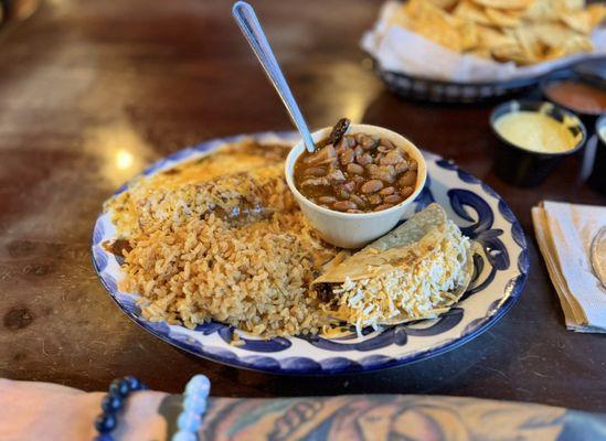 Lunch Tex Mex plate. Awesome flavor. Tripas in the charros... heaven