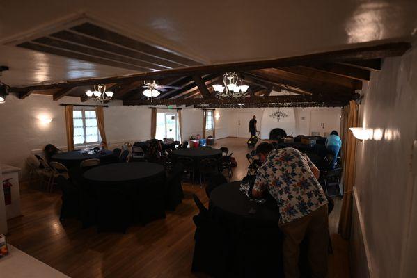 Early Set Up! Roomy, nicely styled, and very cool A/C. Casino tables are being set up on far side of the room.