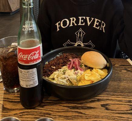 Chilaquiles poblano with scrambled eggs and chorizo.