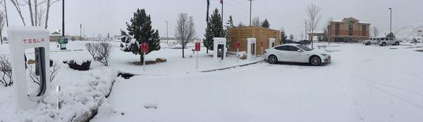 3 inches of snow blanketing the parking lot, almost need chains to get to the supercharger.