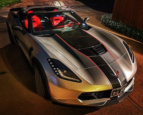 Custom stripes under the lights and new nose as well.