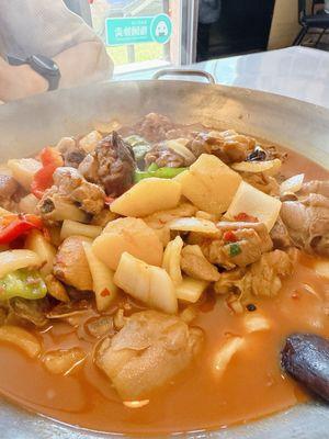 Xinjiang spicy chicken, really flavorful and noodles are my favorite part lol