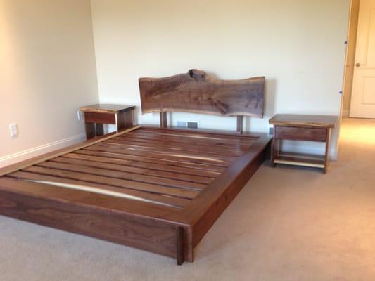 Walnut slab platform bed and matching night stands