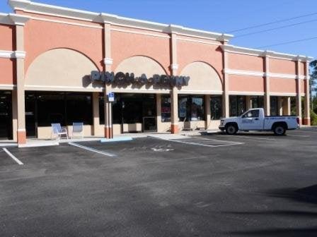 located at the 2nd stop light north of the Roosevelt bridge