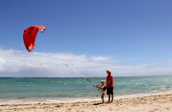 Kiteboard intructor Troy with student extraordinaire Ashland. Complete Kite Boarding Lessons on Maui, Hawaii