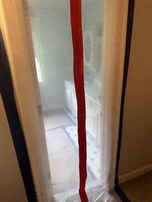 Upper level bathroom containment barrier.