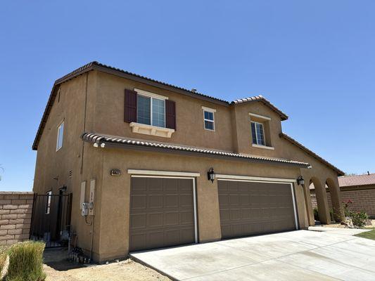 Front, garage, and gate painting.