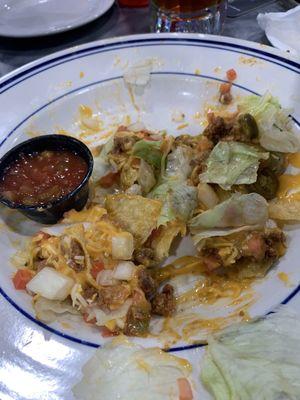 The end of the nachos with more toppings than chips had to use our forks