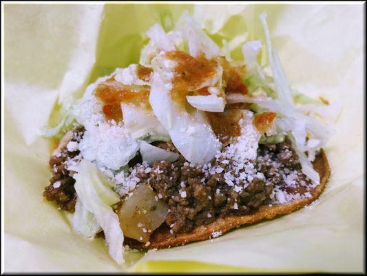 Beef Picadillo Tostada, also available on soft flour tortilla.