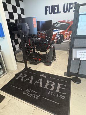 Raabe Ford's race simulator. Ask an employee for help and you can drive your favorite car on your favorite race track!