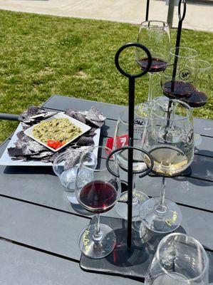 Wine Tasting brought to us in Flight Servers; Spinach-Artichoke Dip.