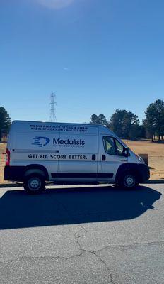 State-of-the-art tour van complete with all the equipment necessary to fit and repair golf clubs.