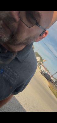 Waves his gun at people in traffic