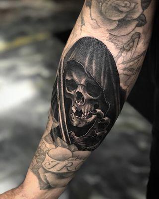 Cover black and grey grim reaper tattoo by @tattoosbymanuel