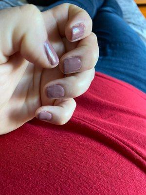 Manicure with gel polish. A bit lumpy but not bad.