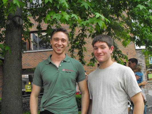Aaron and a happy client at the Tacoma Farmer's Market.