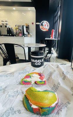 Rainbow bagel w scallion cream cheese.