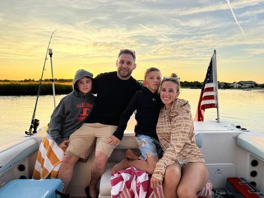A beautiful sunset and quality time with family--just one of the many unforgettable moments on a Buoy Boat Tour from Virginia Beach.